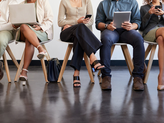 Recruiting university tutors using an interactive group activity