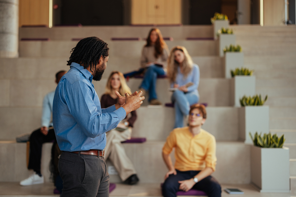 Use the five stages of grief to guide academic staff through AI adoption