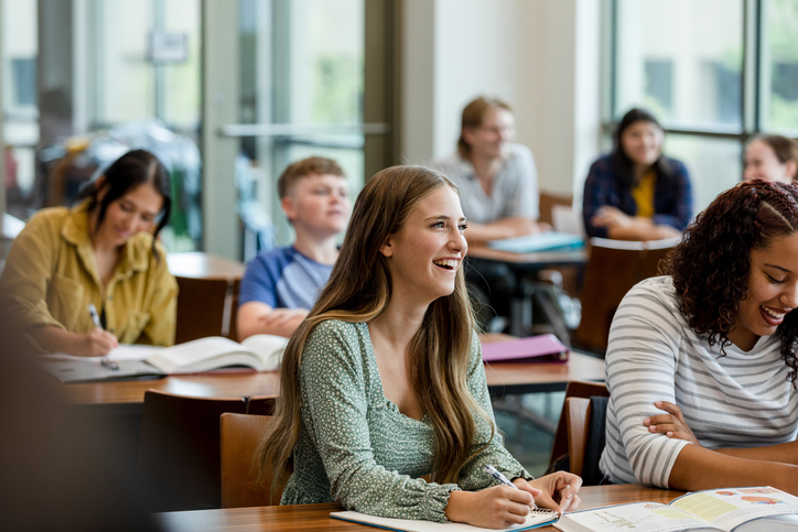 How can we better support female autistic students?