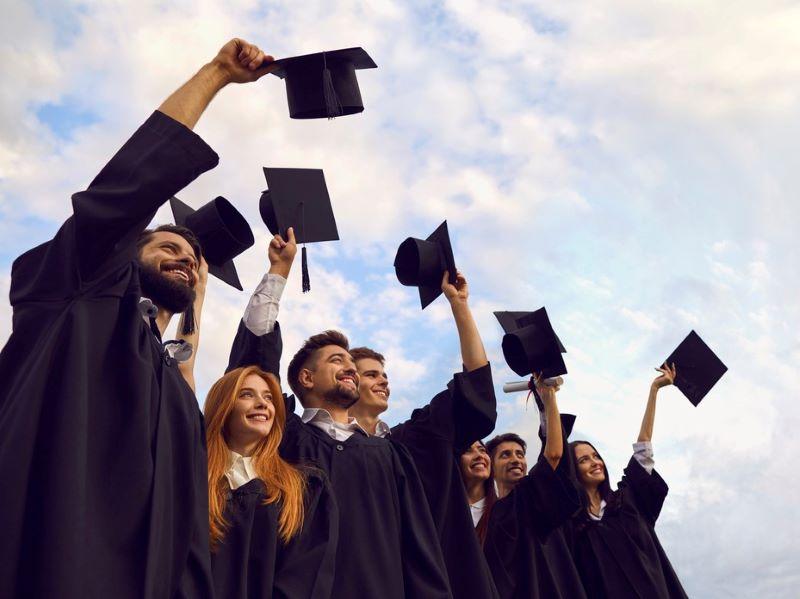 Students celebrating graduation