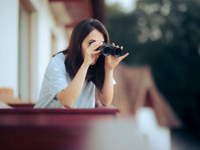 Snooping using binoculars