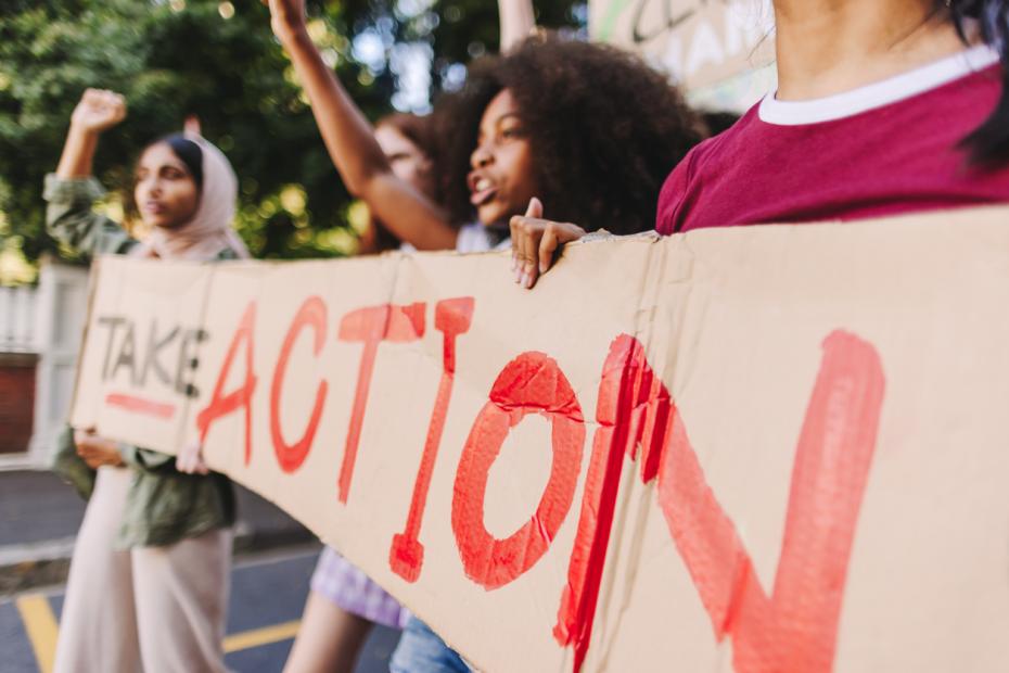 Young women campaigning for more action on climate change