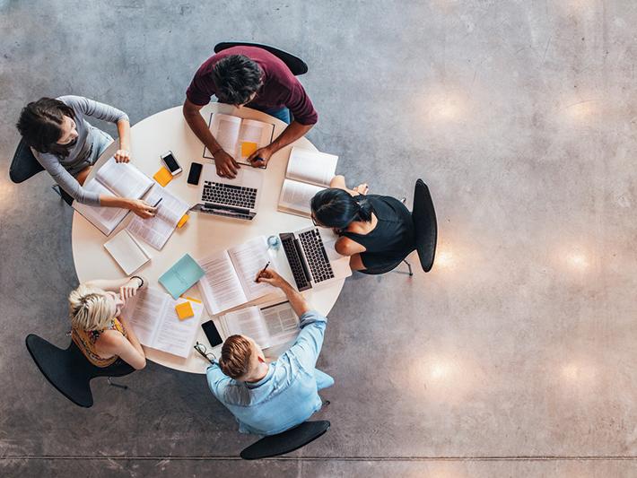 Overhead shot of students around a table