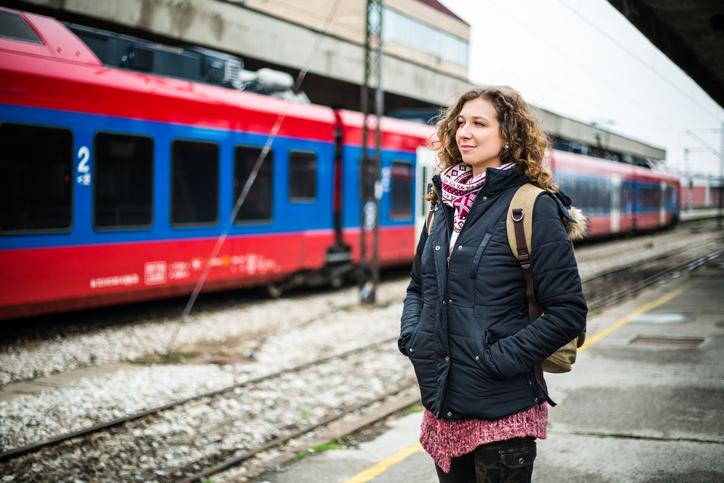 Woman travelling solo train