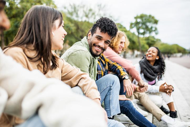 Happy students learning outside