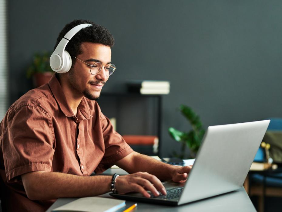 A man working in large headphones