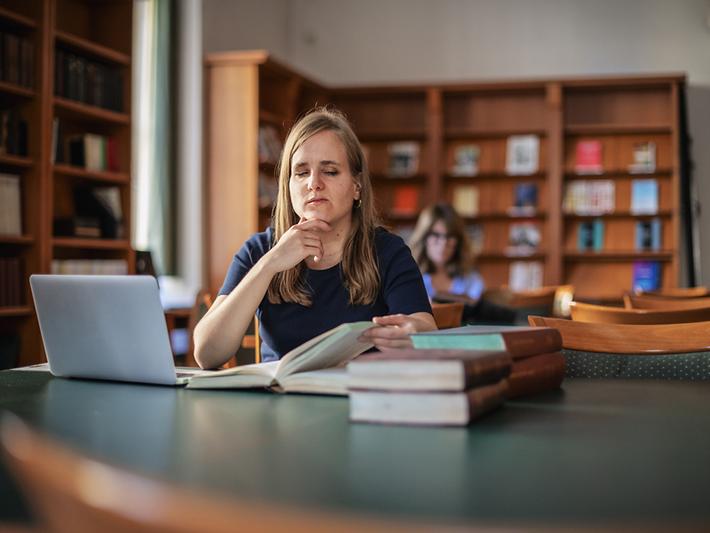 Female vision-impaired student using laptop