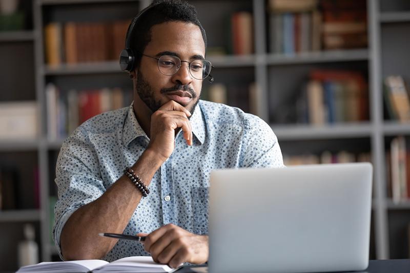 African American man at a laptop