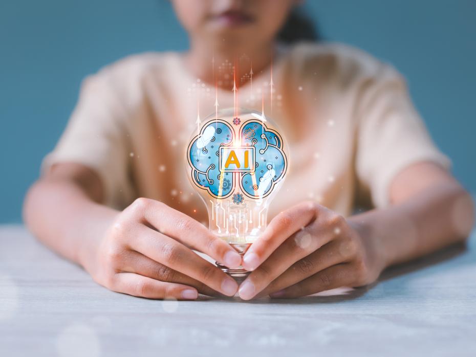 Student looking at a hologram of a brain 