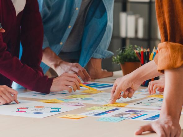 Colleagues collaborating around a table