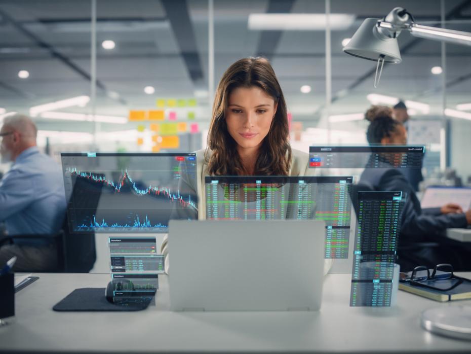 Woman analysing data on her laptop