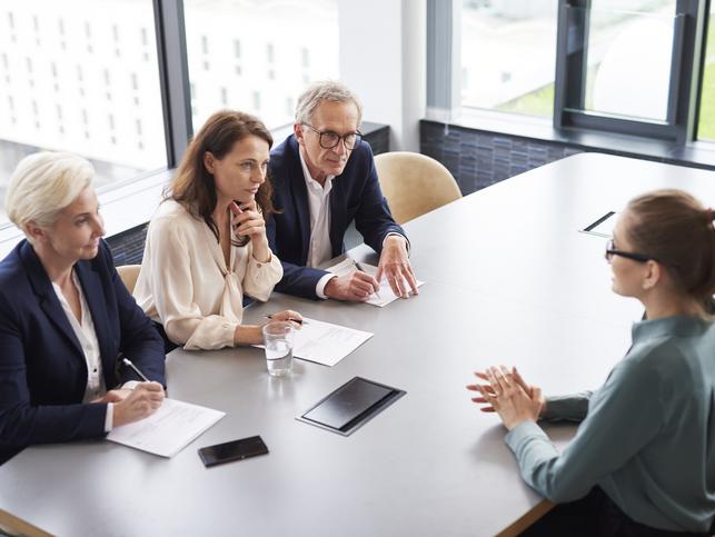 Panel job interview with young female candidate