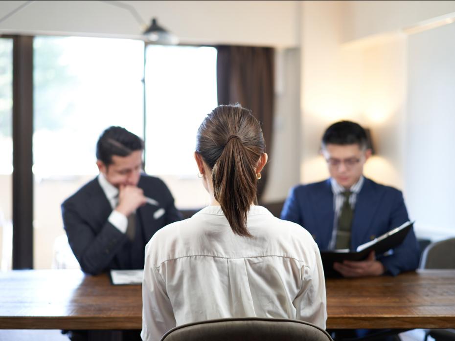 A research student undergoing her viva exam