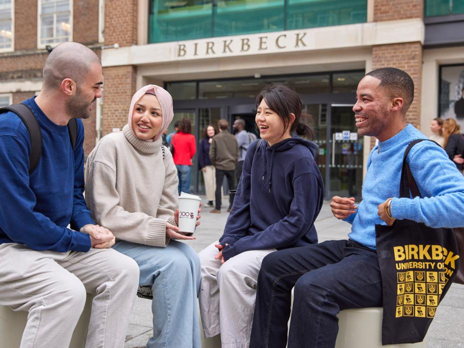 Students chat outside Birkbeck's entrance