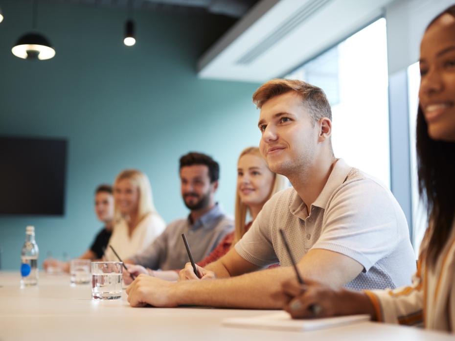 Students sitting in a business placement meeting