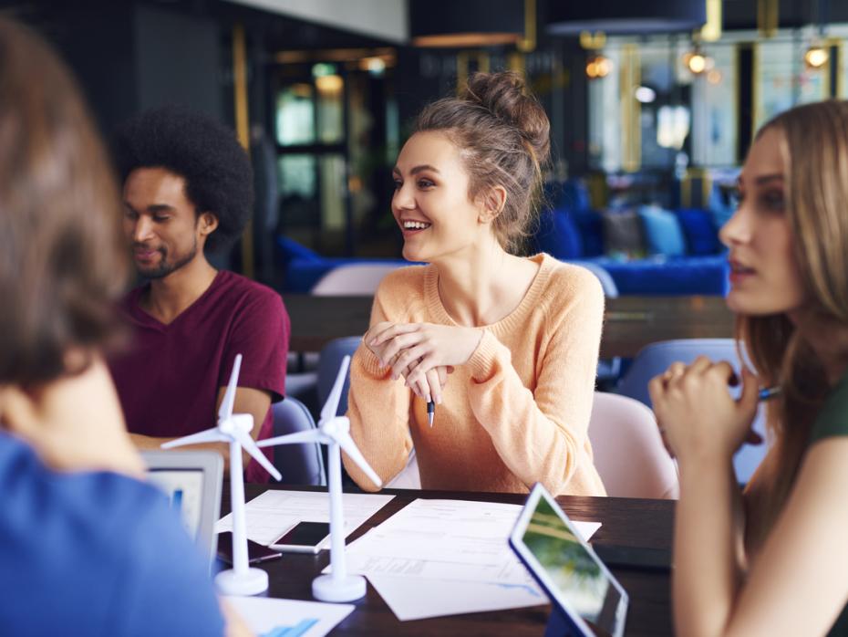 Business students chatting in a classroom