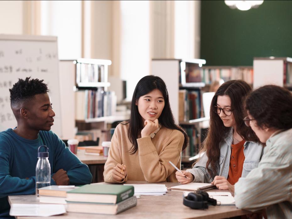 A group of students discussing a case