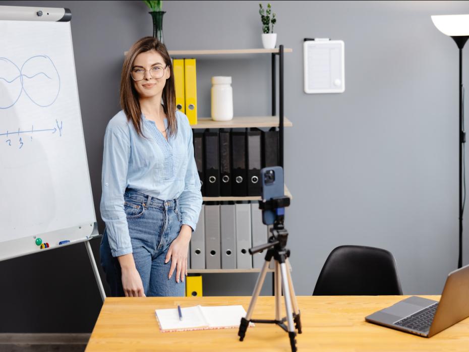 A teacher filming herself on her iphone