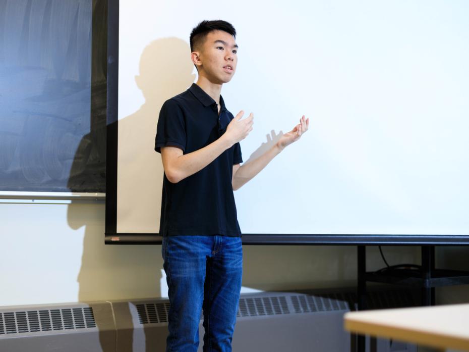 A student giving a presentation in class