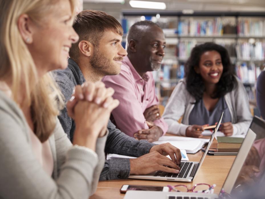 Students and staff on laptops