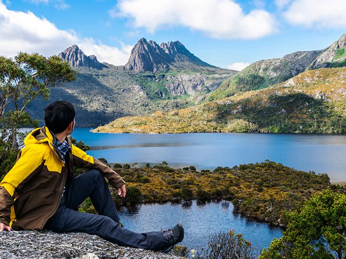 Young man trekking in Tasmania, Australia