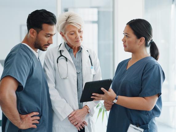 Medical staff discuss information