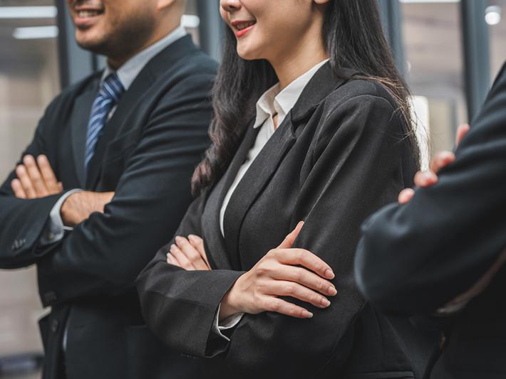 Young businesspeople in suits