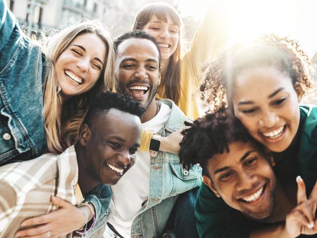 A happy group of students pose for a photo