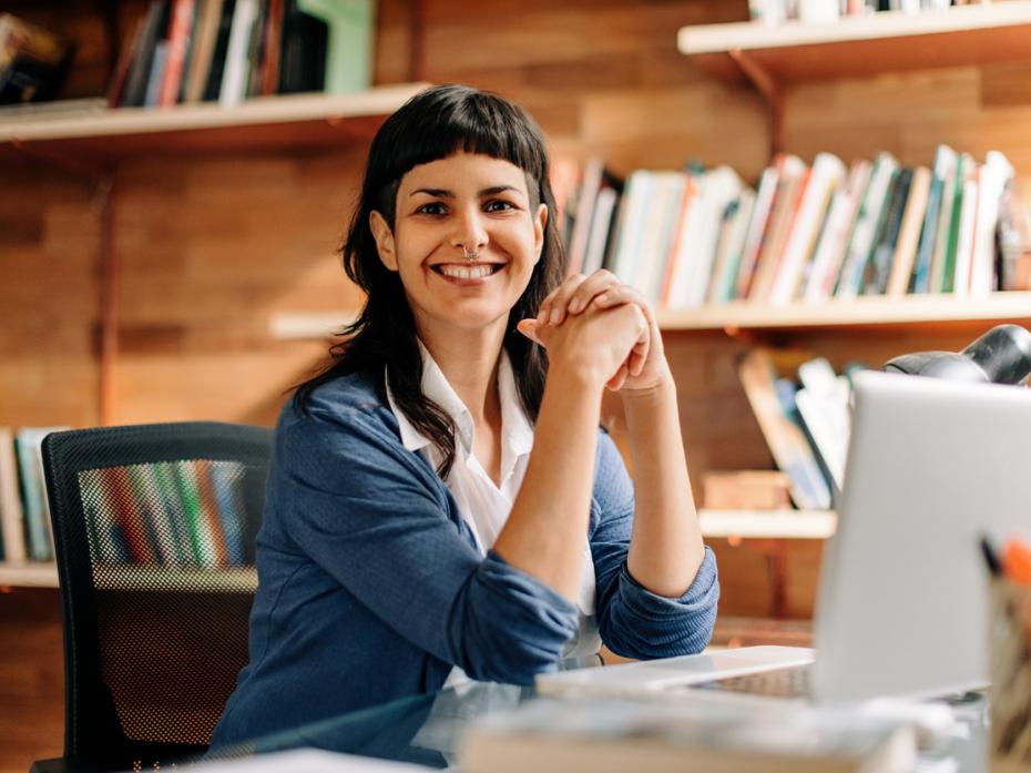 A student smiling to camera