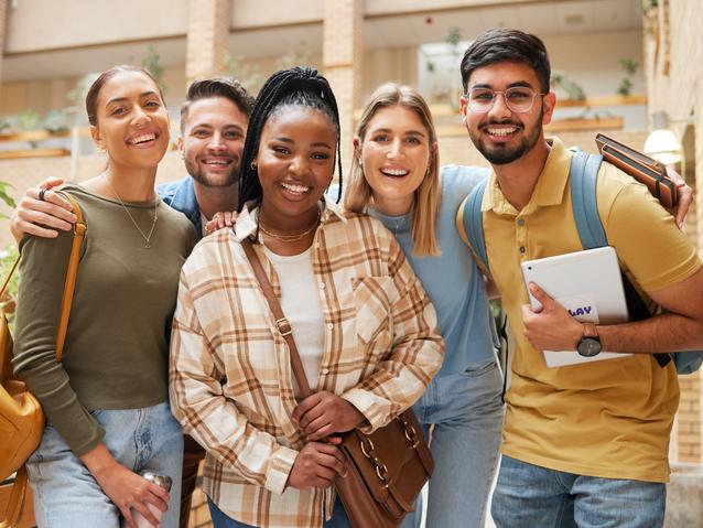 Students pose happily together