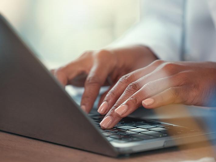 Doctor using laptop