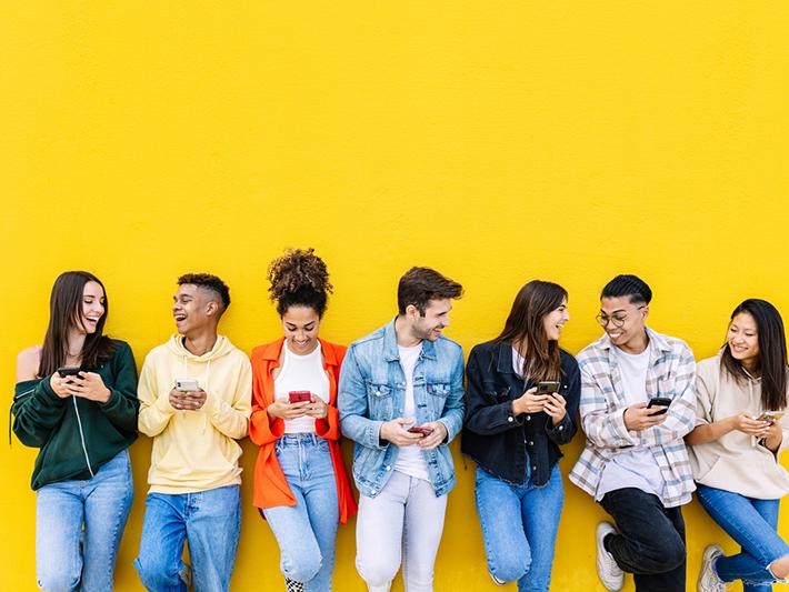 Generation Z students against yellow background