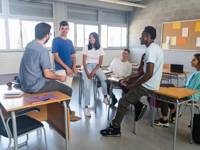 A group of students having a discussion in class