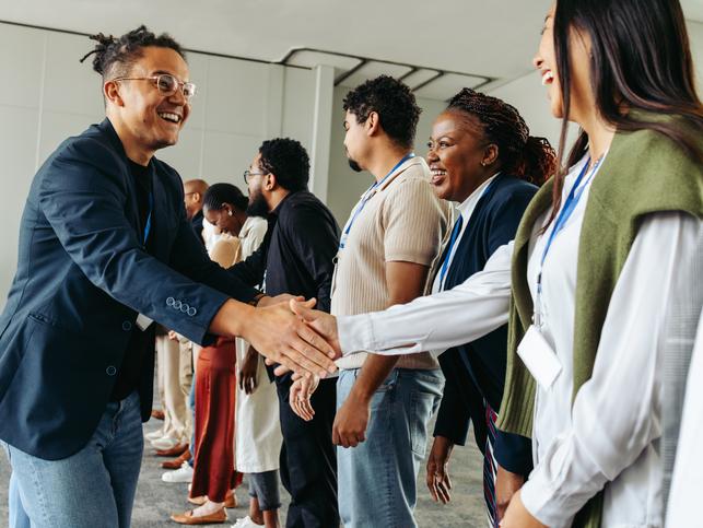 A business professional shakes hands