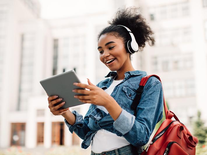 Black female student using tablet