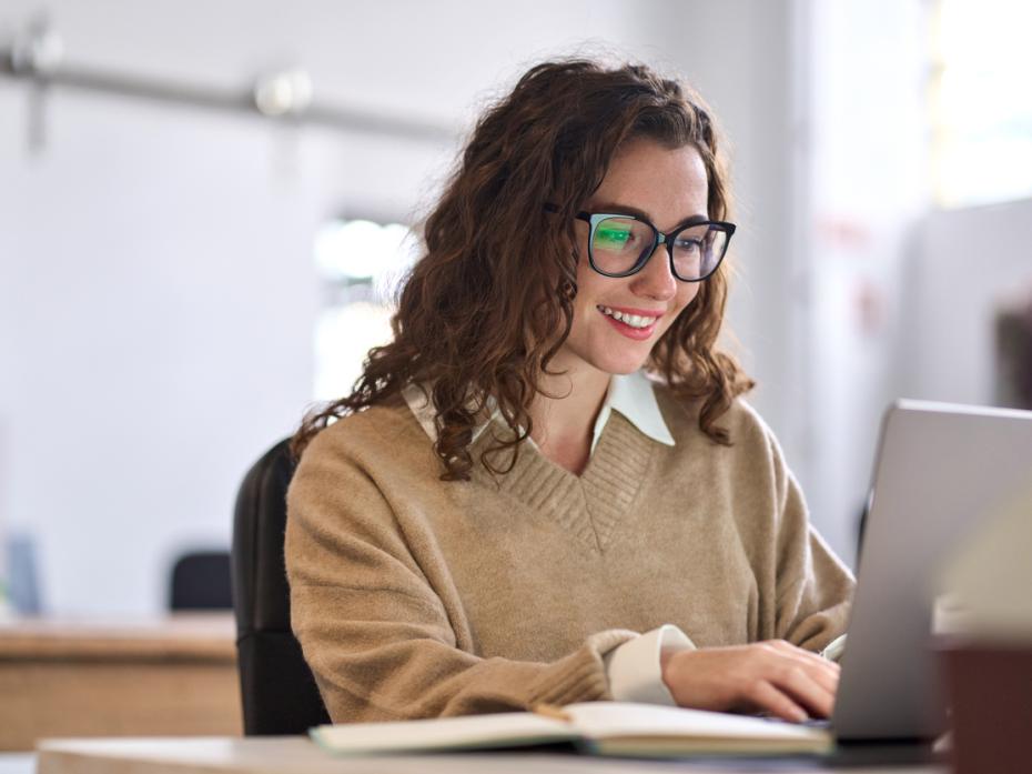 A student at her laptop