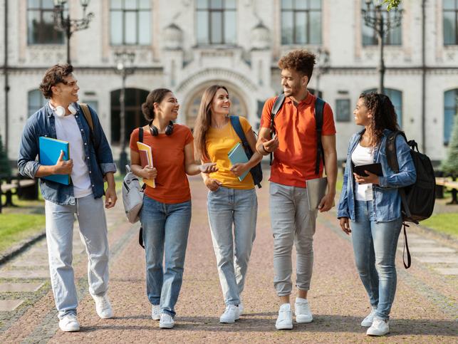 International students laugh together on campus