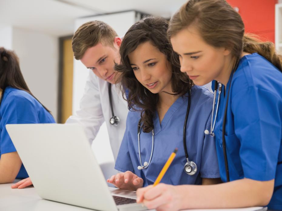 Medical students working on a project together