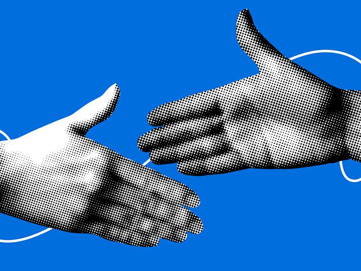 Pixelated hands shaking