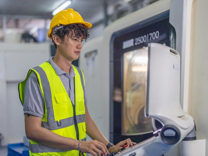 Young Asian robotics trainee