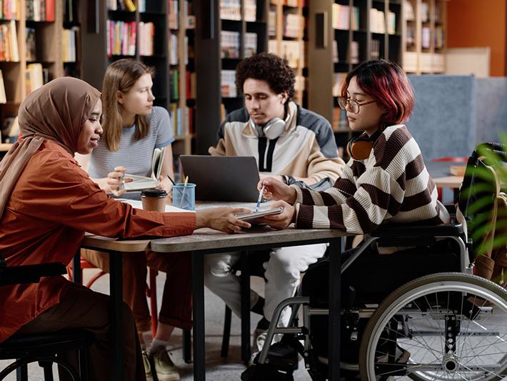 Students working together in library