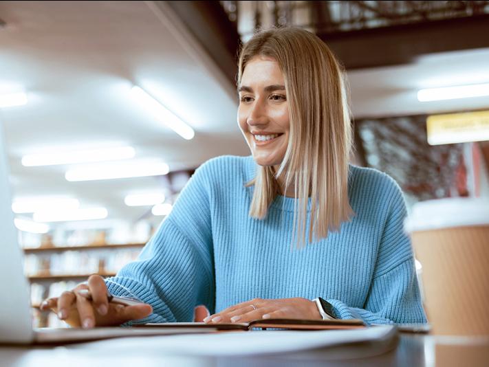 Young female student at laptop