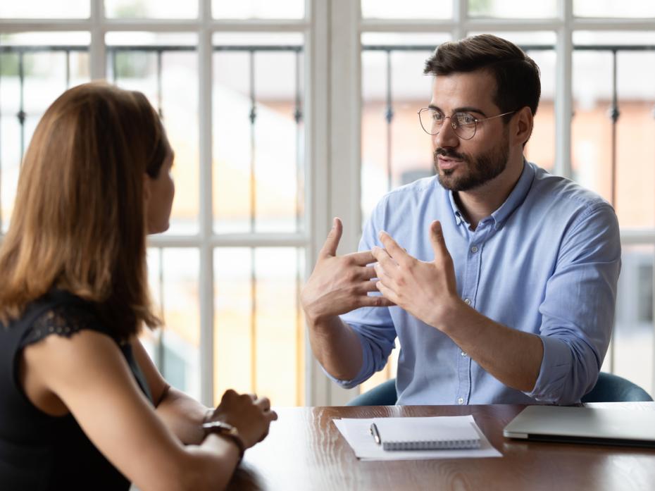 A student and an assessor roleplaying a client meeting