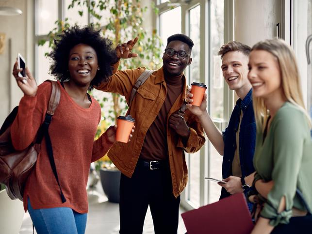 Students welcome each other on campus