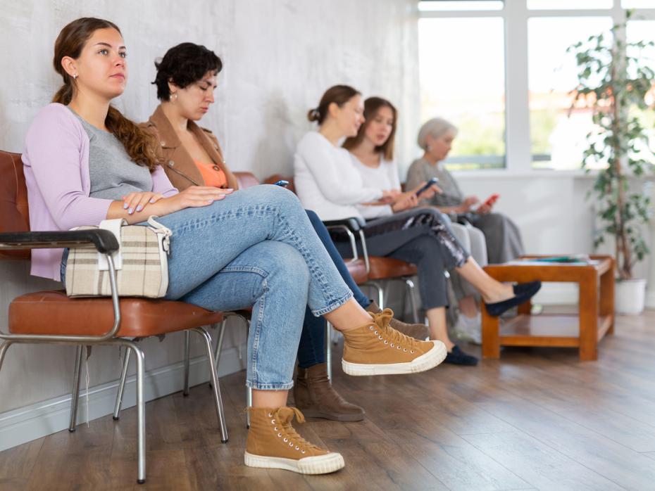 Students sitting in a queue 
