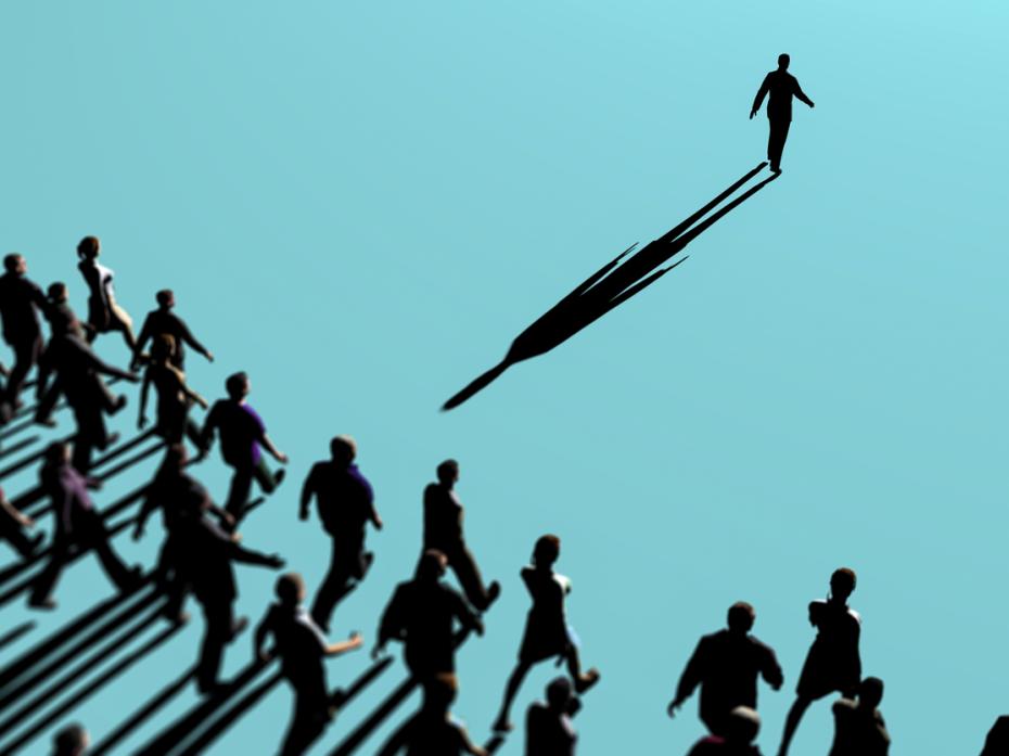 A group of people following someone