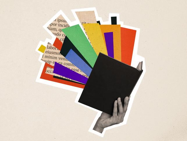 An illustration of a book with coloured and newsprint rays shining out from it