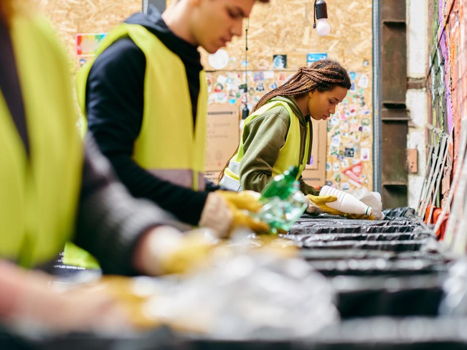 Students recycling at a local community centre