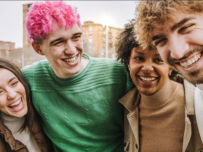 Happy multiracial group of college students
