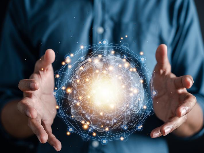 Man holding glowing orb